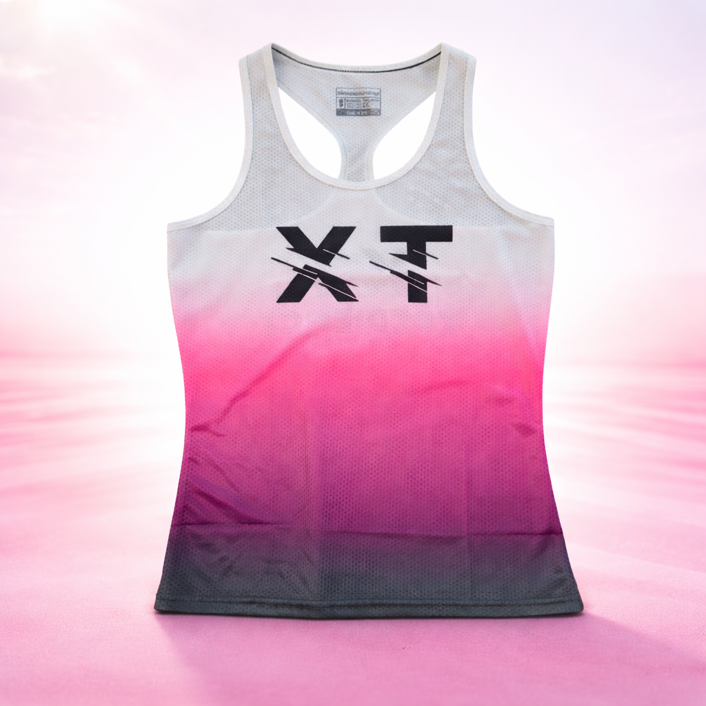 Débardeur XT femme Xperience Training en mesh respirant, dégradé blanc rose, coupe racerback, tenue sportive performance